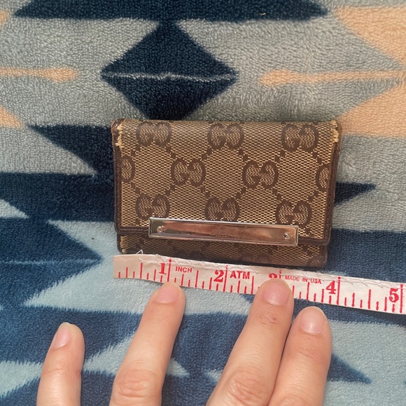 Gucci Handbags - Gucci Brown Monogram Canvas Card Case with Silver-Tone Plate *dirty canvas